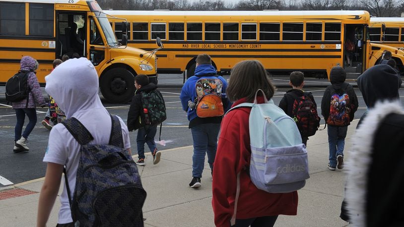Students at Stevenson Elementary school head to the buses Friday March 11, 2022. MARSHALL GORBY\STAFF 