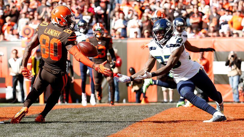 CLEVELAND, OH - OCTOBER 13: Tedric Thompson #33 of the Seattle Seahawks intercepts a pass that was intended for Jarvis Landry #80 of the Cleveland Browns during the second quarter at FirstEnergy Stadium on October 13, 2019 in Cleveland, Ohio. (Photo by Kirk Irwin/Getty Images)