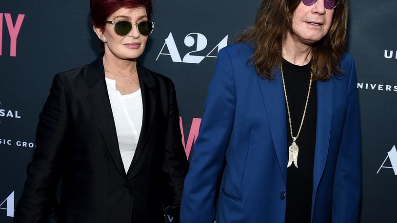 HOLLYWOOD, CA - JUNE 25: Television personality Sharon Osbourne (L) and musician Ozzy Osbourne arrive at the premiere of A24 Films "Amy" at ArcLight Cinemas on June 25, 2015 in Hollywood, California. (Photo by Michael Buckner/Getty Images)