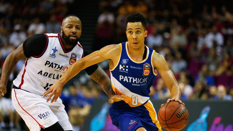 BRISBANE, AUSTRALIA - JANUARY 27:  Travis Trice of the Bullets takes on the defence during the round 16 NBL match between the Brisbane Bullets and the Adelaide 36ers at Brisbane Convention & Exhibition Centre on January 27, 2018 in Brisbane, Australia.  (Photo by Jason O'Brien/Getty Images)
