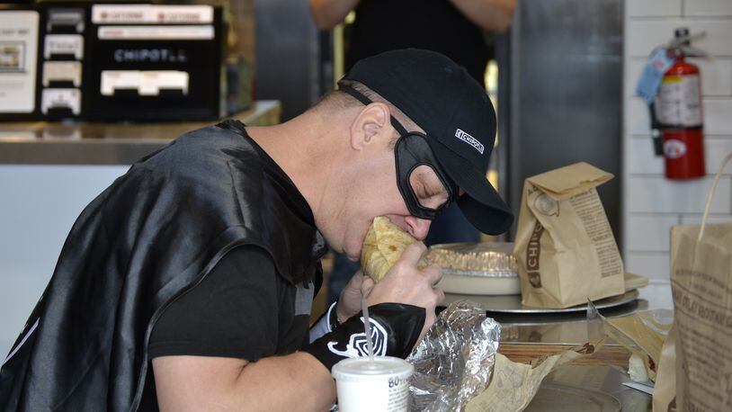 Bruce Wayne, of Tiffin, eats his 426th consecutive Chipotle meal.CONTRIBUTED