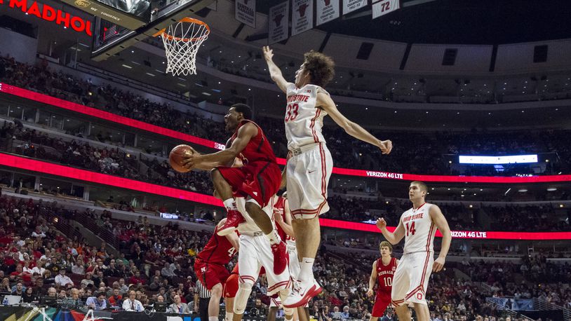 Nebraska Cornhuskers guard Benny Parker shoots over Amedeo Della Valle of the Ohio State Buckeyes during a Big Ten tournament game at the United Center, Chicago, Illinois. (AP Photo/Damen Jackson via Triple Play New Media)