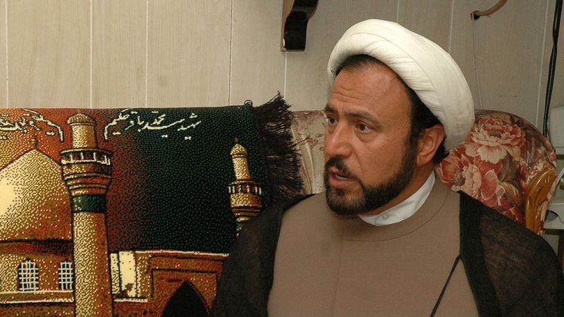 Imam Husham Al-Husainy, director of the Karbalaa Islamic Educational Center in Dearborn, Mich., speaks about the impending execution of Saddam Hussein in December 2006. (AP Photo/Amy E. Powers)
