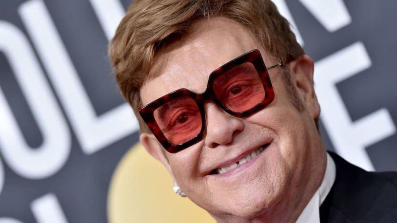 Elton John had to flee the stage Friday night in Australia when heavy rains hit during his concert.