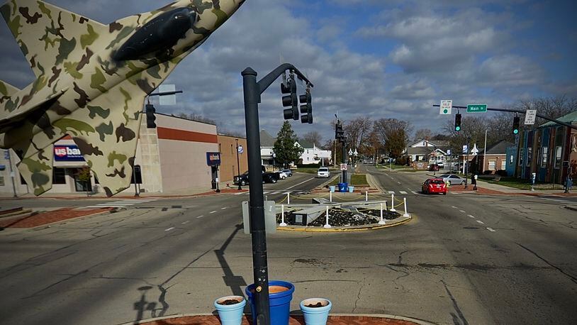 The Main Street and Central Avenue traffic circle in downtown Fairborn may be converted into a roundabout to improve flow and safety. MARSHALL GORBY\STAFF
