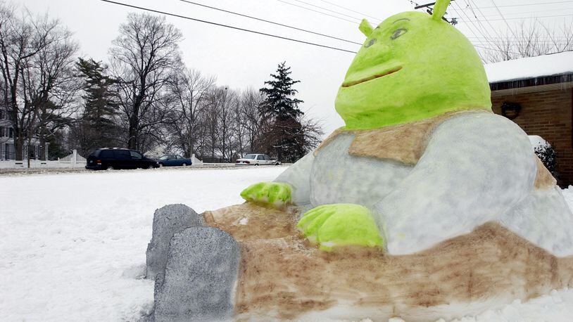 Motorists along Central Avenue in Springboro were greeted by a snow sculpture of the cartoon character Shrek on Tuesday Feb. 18, 2003. FILE PHOTO