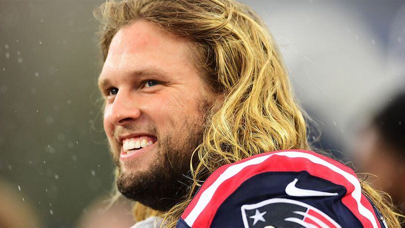 Defensive end Chase Winovich, #50 of the New England Patriots, looks on prior to their game against the Cleveland Browns at Gillette Stadium on October 27, 2019 in Foxborough, Massachusetts.
