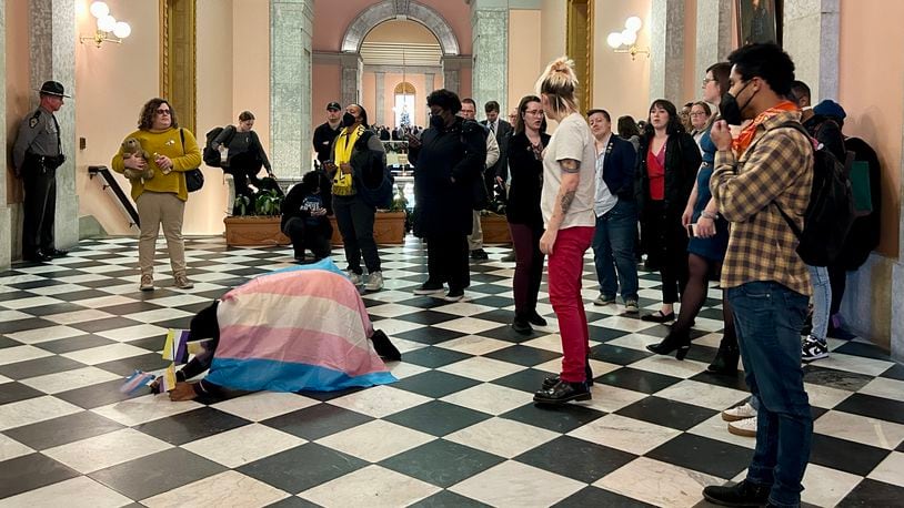 A group of protesters chants the word "shame" after the Ohio Senate passes an amended version of House Bill 68, banning minors from undergoing gender affirming medical treatments. Dec. 13, 2023.