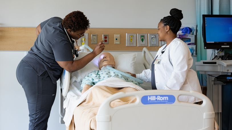(L to R) Sinclair Community College Nursing students Areun Foster and Danielle Johnson in the Health Sciences Simulation Center. COURTESY OF SINCLAIR