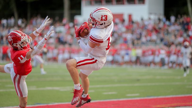 Wittenberg’s Tyler May makes a game-winning catch in overtime against Denison on Saturday, Sept. 30, 2023, in Granville. Photo by Jace Delgado, Denison University