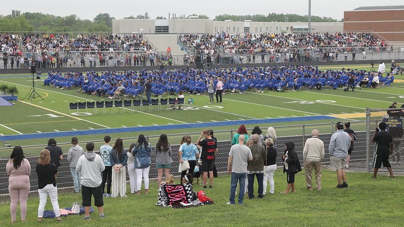Graduation dates for Clark and Champaign County high schools and colleges have been scheduled between May 11 and June 1. In this file photo, Springfield High School held their 2022 Commencement Ceremony Saturday, May 28, 2022 at Springfield Wildcat Stadium. It was the first traditional graduation for the school in two years due to the COVID pandemic. FILE/BILL LACKEY/STAFF