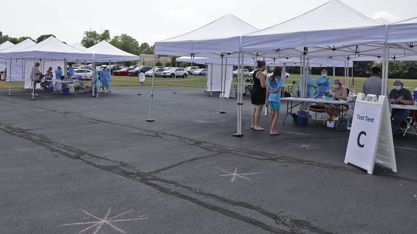 A free COVID-19 testing clinic is set up in the rear parking lot at Hayward Middle School Wednesday. BILL LACKEY/STAFF