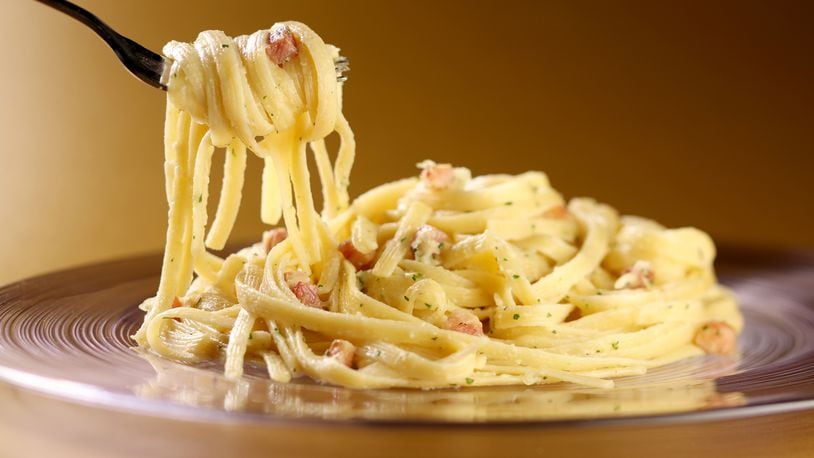 Carbonara, made from pasta, egg, panchetta, and hard cheese, is just one of the many types of dishes you can try to celebrate National Pasta Day. (Food styling by Mark Graham.) (Michael Tercha/Chicago Tribune/TNS)
