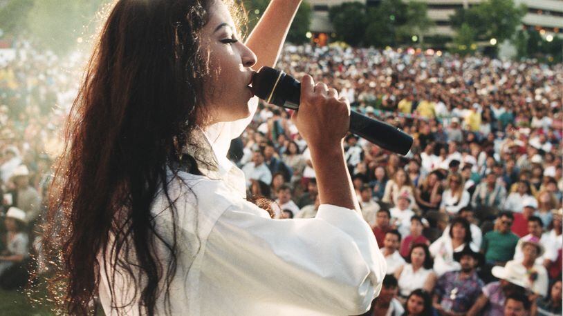 Selena performs at Hemisfair Plaza in San Antonio, TX, April 24, 1994. Photo by Sung Park / The Austin American-Statesman.