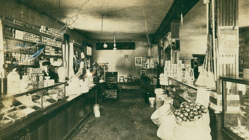 Edward L. Monger, a former machinist who came to Ohio from Indiana in the 1880s, opened a grocery store in Tremont in the early 1900s. The interior of the store is shown here around 1910 when a young Earl R. McKinley was the clerk. McKinley later went on to work at one of the many Kroger s bakery and groceries in Springfield and Edward Monger moved to New Carlisle where he opened Monger s Grocery on Main Street. CONTRIBUTED BY THE CLARK COUNTY HISTORICAL SOCIETY