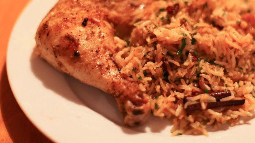 Cajun Chicken and Caramelized Onion Rice. LINDA GASSENHEIMER/TRIBUNE NEWS SERVICE