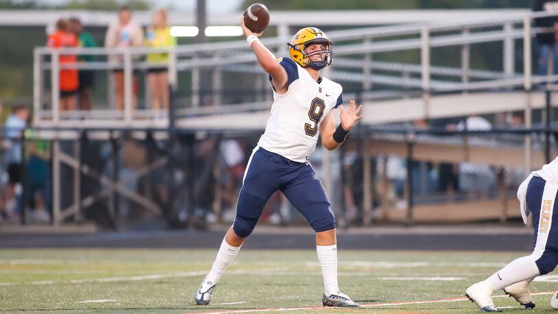 Springfield High School senior quarterback Bryce Schondelmyer throws the ball during their game against Beavercreek on Friday, Sept. 16, 2022 at Miami Valley Hospital Stadium in Beavercreek. Schondelmyer threw six TD passes as the Wildcats won 49-17. CONTRIBUTED PHOTO BY MICHAEL COOPER