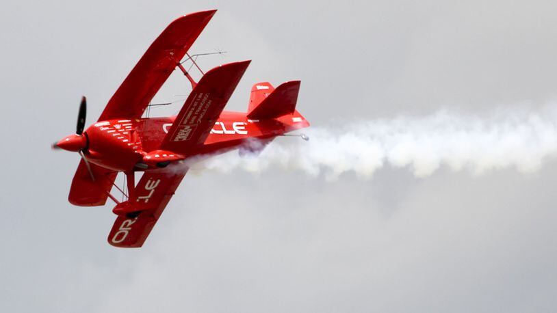 Sean D. Tucker and his Oracle Challenger III perform during the Vectren Dayton Air Show held at the Dayton International Airport, Sunday, June 29, 2014. GREG LYNCH / STAFF FILE PHOTO