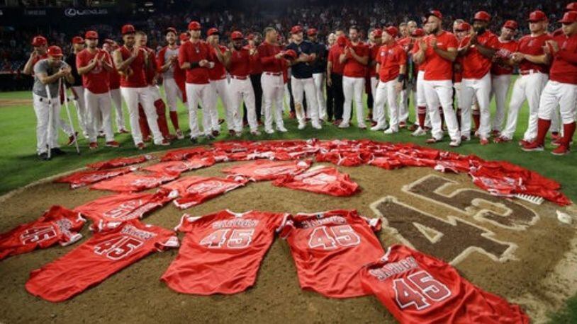 Angels players put their No. 45 jerseys on the mound to honor fallen teammate Tyler Skaggs after Anaheim completed a no-hitter against Seattle on Friday night.