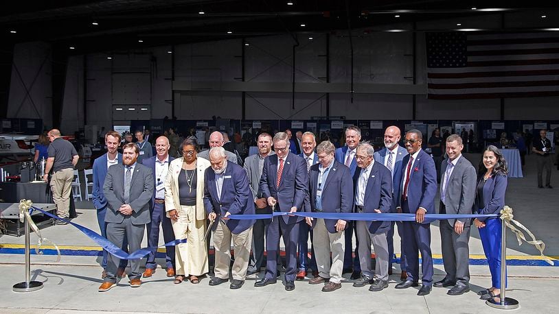 Springfield, state and national officials cut the ribbon for the new National Advanced Air Mobility Center of Excellence at Springfield-Beckley Airport Monday, Sept. 18, 2023. BILL LACKEY/STAFF