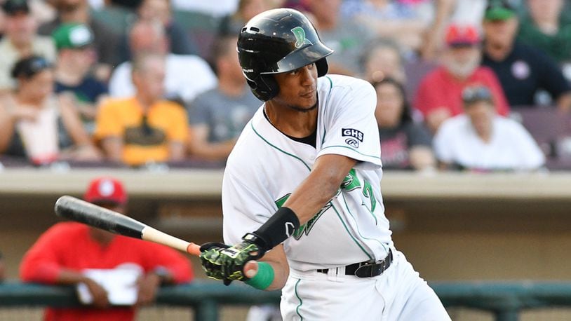 Jose Siri swings during a game against Burlington on Monday night at Fifth Third Field. Siri has recorded hits in his last 30 games, which is the third-longest streak in Midwest League history. Contributed Photo by Bryant Billing
