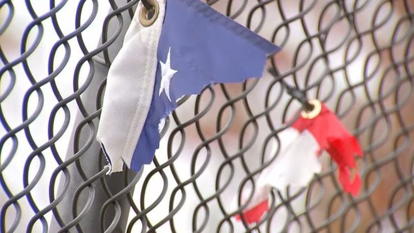 American flags were ripped from several over passes. (Photo: Boston25News.com)