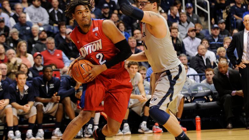 Dayton's Jalen Robinson drives past a Xavier defender during the first half on Wednesday, Jan. 30, 2013.
