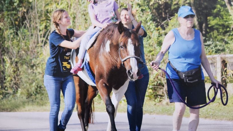 A student at The Riding Centre in Yellow Springs on “Honey Pepper.” Honey Pepper has been adopted by Springfield Rotary. Almost every teacher who wants to do therapeutic riding with their grant stipend uses The Riding Centre in Yellow Springs. Contributed