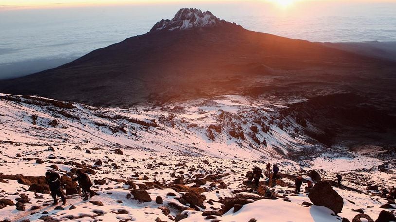 ARUSHA, TANZANIA - DECEMBER 11: Trekkers climb up to Stella Point at Mt. Kilimanjaro on December 11, 2010 in Arusha, Tanzania.  (Photo by Chris Jackson/Getty Images for Laureus)