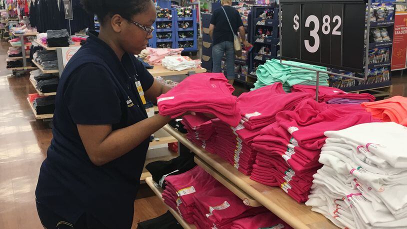 Walmart gave more than $200 million in bonuses, with more than $6.3 in Ohio. STAFF PHOTO / HOLLY SHIVELY