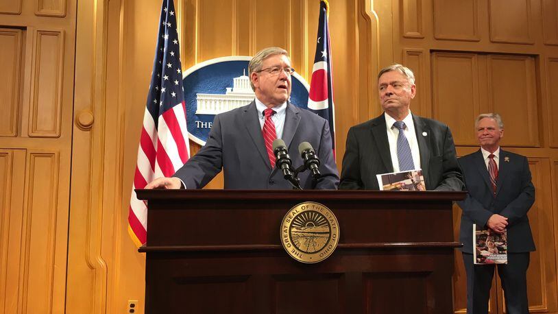 State Reps. Bob Cupp (left) and John Patterson announce a school funding plan March 25, 2019, after more than a year of work by a committee of educators, politicians and others. LAURA A. BISCHOFF / STAFF