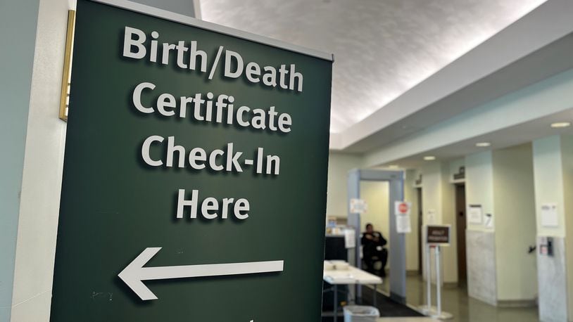 A sign at the office of vital statistics at
Public Health – Dayton & Montgomery County, located on South Main Street in downtown Dayton. Ohio has seen more deaths than births during the pandemic. CORNELIUS FROLIK / STAFF