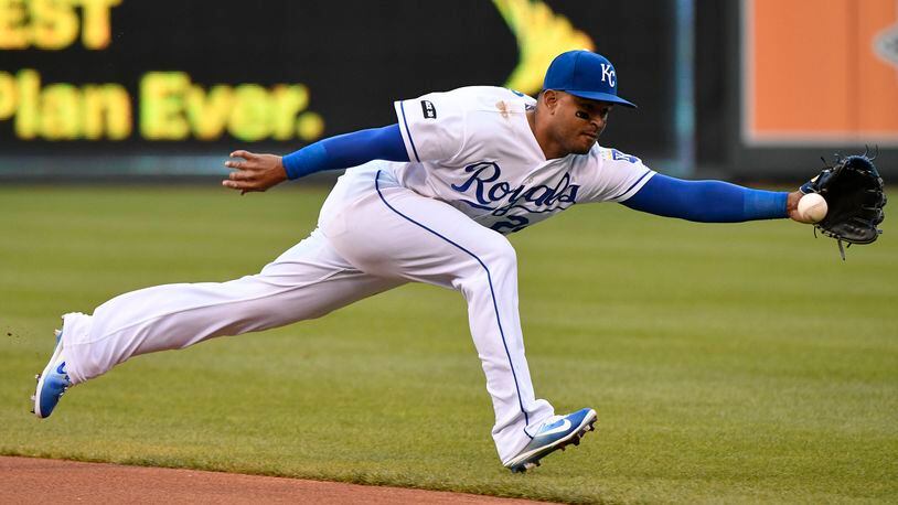 KANSAS CITY, MO - MAY 2: Christian Colon #24 of the Kansas City Royals reaches out but can’t stop a ball hit by Yolmer Sanchez #5 of the Chicago White Sox in the first inning at Kauffman Stadium on May 2, 2017 in Kansas City, Missouri. (Photo by Ed Zurga/Getty Images)