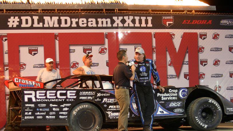 Tennessee’s Scott Bloomquist celebrates on Eldora Speedway’s victory lane stage after winning his record-extending seventh $100,000 Dirt Late Model Dream on Saturday. Contributed photo / Greg Billing