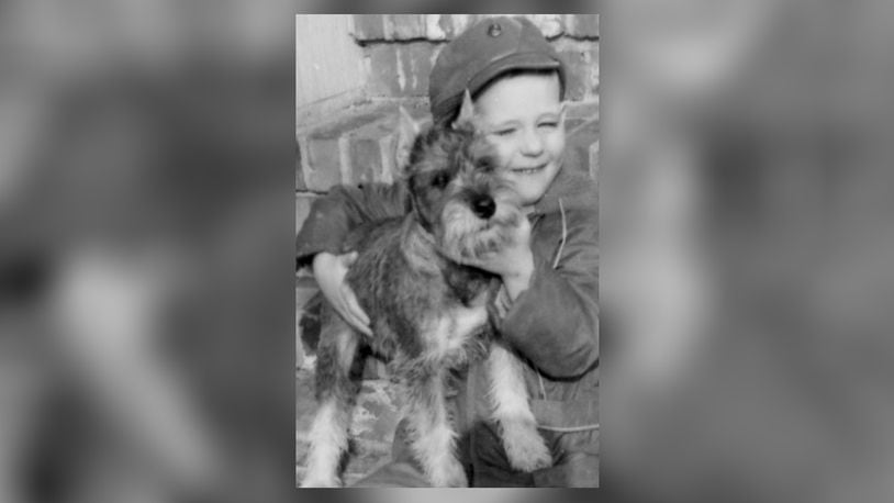 A very young Ed with his puppy, Fritz. CONTRIBUTED