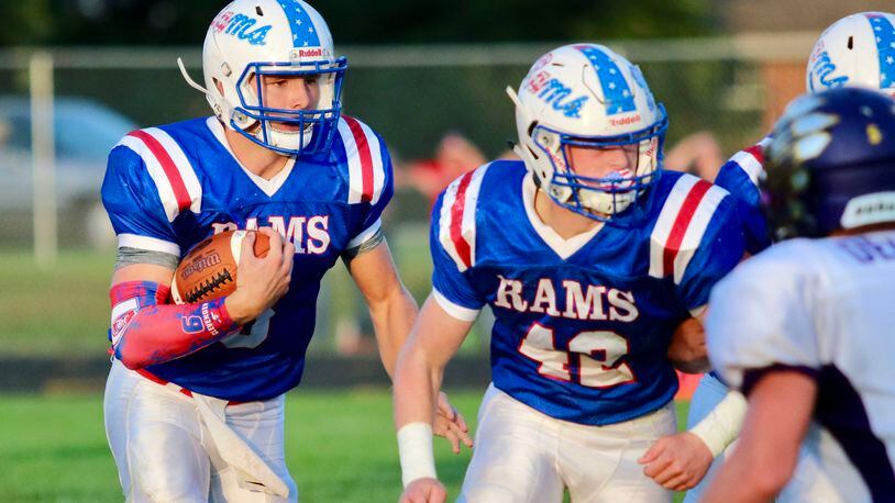 Greeneview High School quarterback Nick Clevinger runs the ball during the Rams game against Mechanicsburg in Jamestown on Friday night. The Indians won 7-0. Michael Cooper/CONTRIBUTED