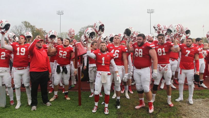 Wittenberg players sing the fight song after a victory against Ohio Wesleyan on Saturday, Nov. 4, 2017, at Edwards-Maurer Field in Springfield. David Jablonski/Staff