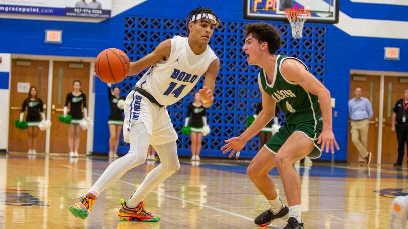 Springboro's RJ Greer looks for an opening during a game vs. Mason last season. Jeff Gilbert/CONTRIBUTED