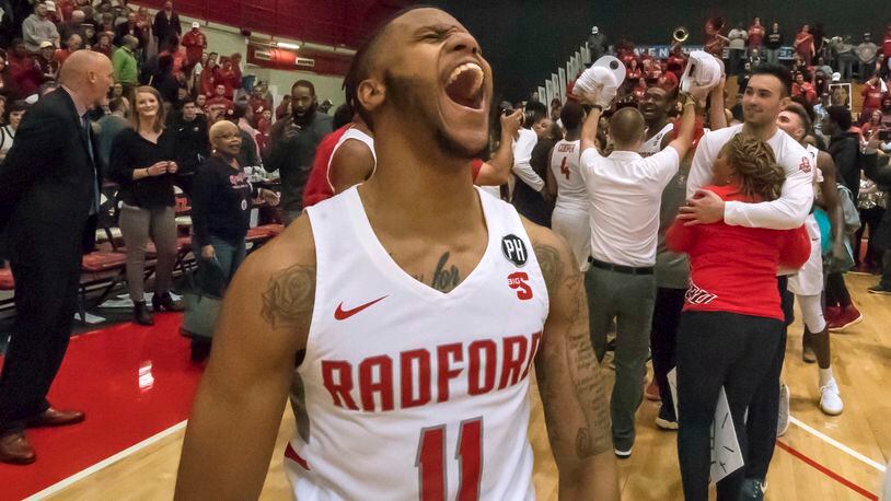 Radford guard Travis Fields Jr. (11) celebrates after winning at the buzzer in the Big South Conference championship NCAA college basketball game against Liberty, Sunday, March 4, 2018, in Radford Va. (AP Photo/Don Petersen)