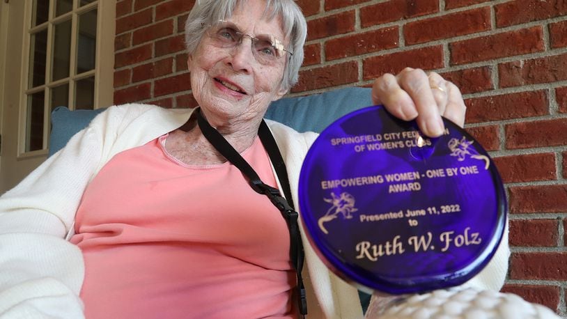 Ruth Folz with her award from the Springfield Women's Club. BILL LACKEY/STAFF