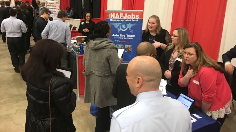 Area people attend a OhioMeansJobs Montgomery County and Wright-Patterson Air Force Base career fair at the Dayton Convention Center in April. FILE