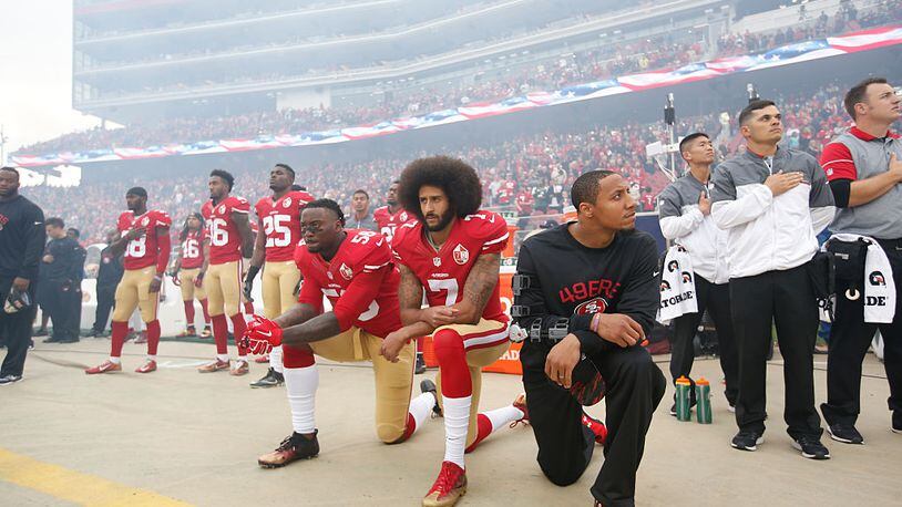 Colin Kaepernick (7) was criticized for kneeling on the sidelines during the national anthem last season.