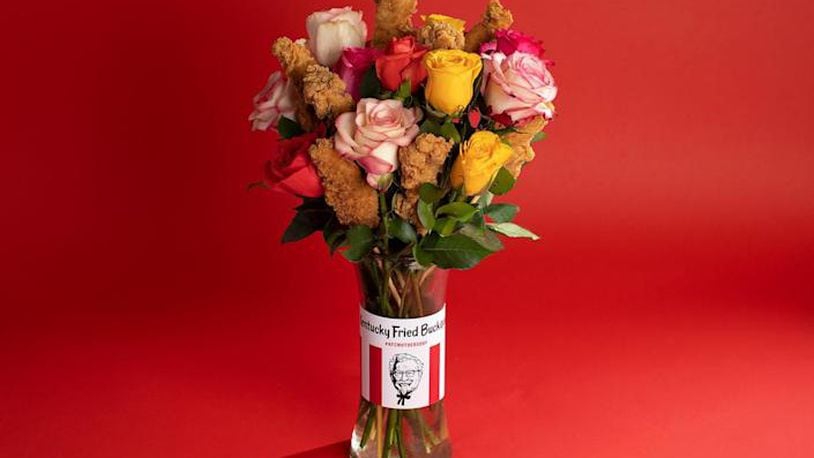A suggestion marketed this year by Kentucky Fried Chicken. They’re calling it a “buckquet,” and it consists of a glass vase containing a dozen roses along with eight wooden skewers on which the Colonel’s tenders can be impaled.