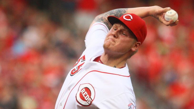 The Reds' Mat Latos pitches against the Athletics on Tuesday, Aug. 6, 2013, at Great American Ball Park in Cincinnati. David Jablonski/Staff