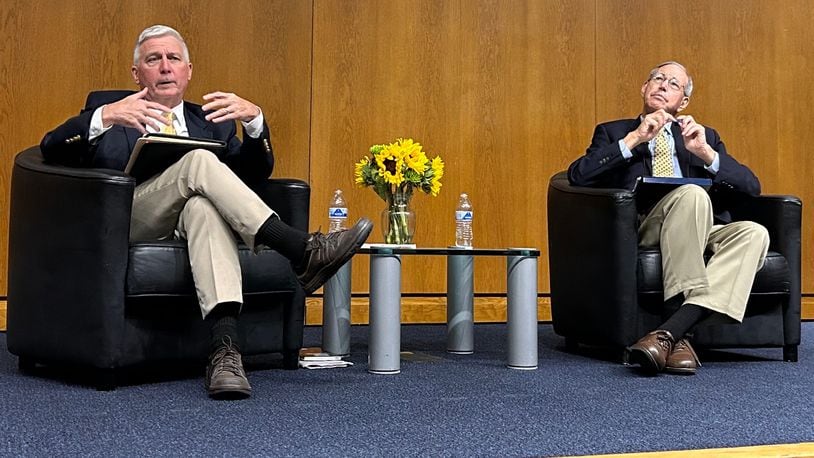 Former Ohio Gov. Bob Taft (right) and former state Rep. Mike Curtin (left) participate in a June forum hosted by the Dayton League of Women Voters centered on the Aug. 8 special election for Issue 1. AVERY KREEMER/STAFF