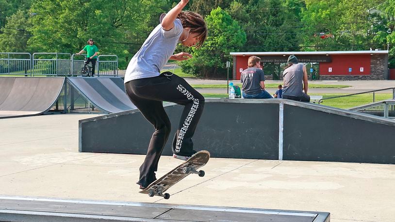A skateboarder skates at the Springfield skate park on Mitchell Boulevard on  Wednesday evening May 17, 2023, near the National Trail Parks and Recreation District headquarters. NTPRD and the Clark County Park District are considering a merger. BILL LACKEY/STAFF