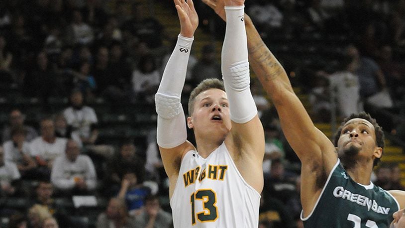 Wright State’s Grant Benzinger puts up a shot against Green Bay during last year’s game at the Nutter Center. KEITH COLE/CONTRIBUTED PHOTO