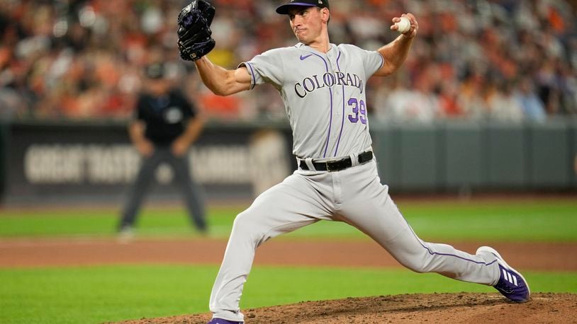 Colorado Rockies relief pitcher Brent Suter throws to the Baltimore Orioles during the eighth inning of a baseball game, Friday, Aug. 25, 2023, in Baltimore. The Orioles won 5-4. (AP Photo/Julio Cortez)