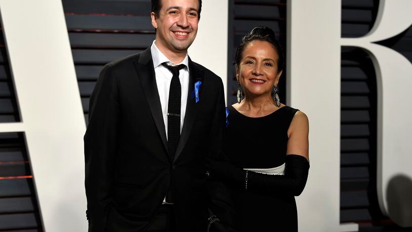 Lin-Manuel Miranda, left, and Luz Towns-Miranda arrive at the Vanity Fair Oscar Party on Sunday, Feb. 26, 2017, in Beverly Hills, Calif. (Photo by Evan Agostini/Invision/AP)