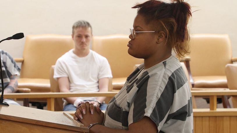 Nakisha Martin is arraigned in Clark County Municipal Court Tuesday. A Springfield man also accused in the case did not appear in court. BILL LACKEY/STAFF